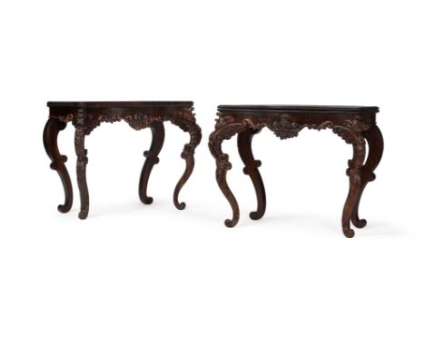 Y A PAIR OF PORTUGUESE CARVED ROSEWOOD FOLDING CARD TABLES19TH CENTURY each 77cm high, the tops 92cm wide, 47cm deep Conditio