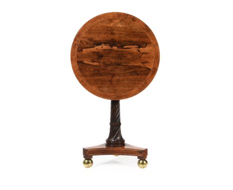 Y A REGENCY ROSEWOOD OCCASIONAL TABLECIRCA 1820The tilt top and triform parquetry strung73cm high, 61cm diameterCondition Rep