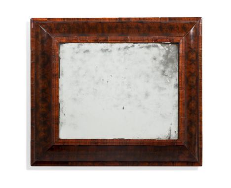 A LARGE WILLIAM & MARY OLIVEWOOD OYSTER VENEERED MIRRORCIRCA 1690Incorporating cross grain mouldings93cm high, 73cm wideCondi