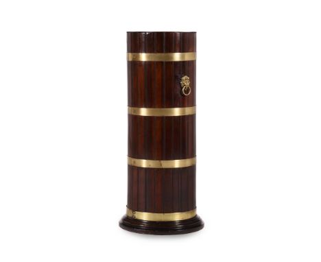 A MAHOGANY AND BRASS BOUND STICK STAND LATE 19TH OR EARLY 20TH CENTURYOf coopered form 78cm high, the base 34cm diameter Plea