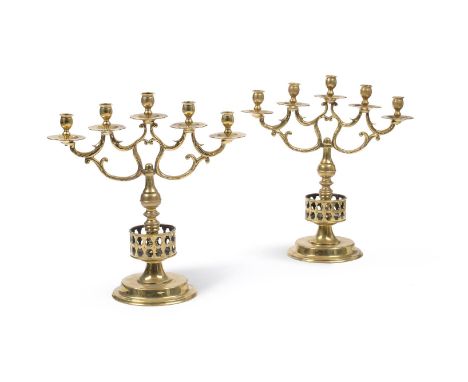 A PAIR OF BRASS FIVE LIGHT CANDELABRA 19TH CENTURY, IN THE 17TH CENTURY MANNER Plain nozzles above leaf scrolling arms, centr