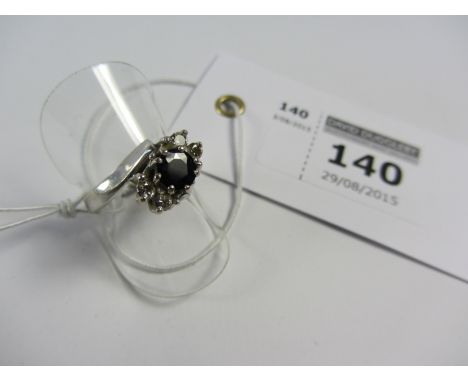 Sapphire and diamond white gold ring hallmarked 18ct maker's mark TAD