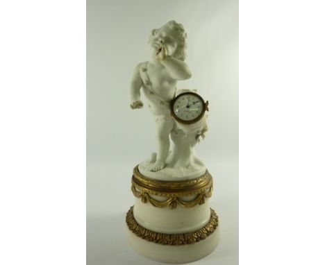 Mid 19th century table clock in the form of a Parian cherub carrying a drum, watch type movement white enamel dial signed Js.