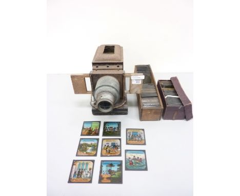 Set of eight coloured magic lantern slides titled 'Ten Little Nigger Boys, collection of other slides and a projector 