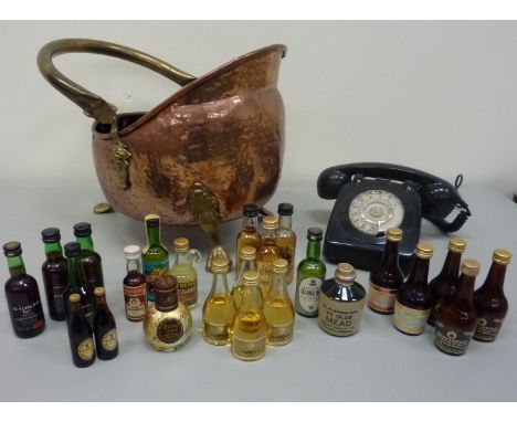Retro rotary dial telephone, copper coal helmet with brass paw feet and a collection of alcohol miniatures 