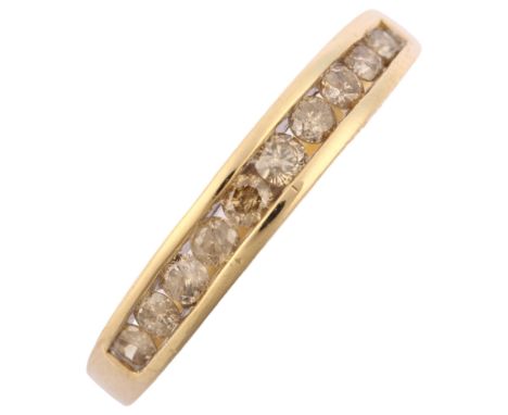 A modern 9ct gold diamond half eternity ring, channel set with modern round brilliant-cut diamonds, total diamond content app