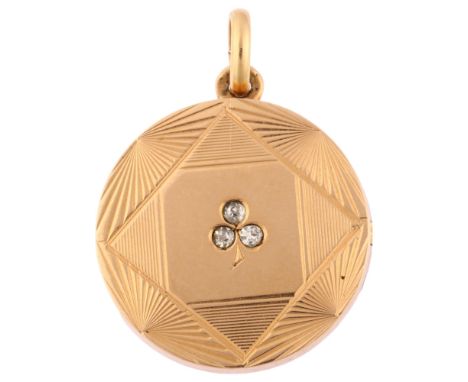 An early 20th century French gold and diamond shamrock photo locket pendant, engraved sunburst decoration set with old-cut di