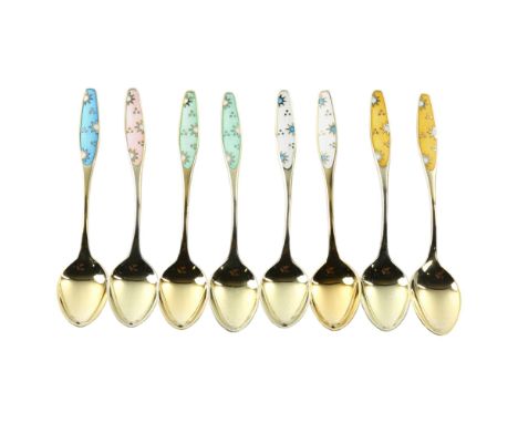 FRIGAST - a set of 8 Danish vermeil sterling silver and harlequin enamel coffee spoons, with sun design, length 9.5cmNo damag