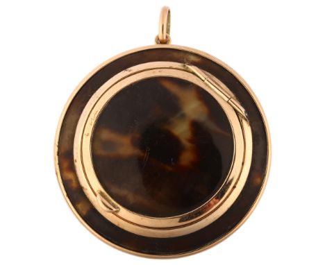 An Art Deco 9ct rose gold mounted tortoiseshell power compact, maker's marks C&C, diameter 5.5cm, 18.4gMirror glass is cracke
