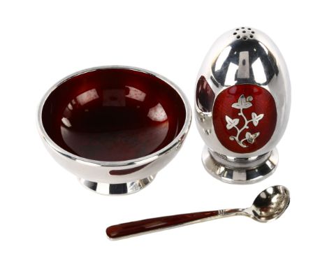 MEKA - a Danish modernist sterling silver and red enamel cruet set, comprising egg-shaped pepperette, salt cellar and spoon, 