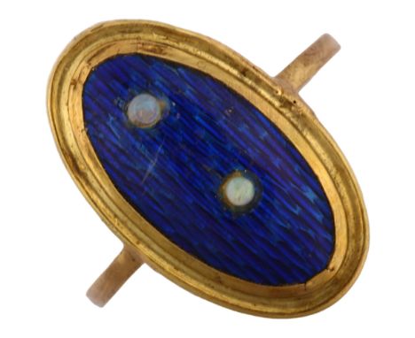 An Antique blue enamel and opal panel ring, unmarked yellow metal settings, setting height 21.1mm, size M, 2.2gRing has been 