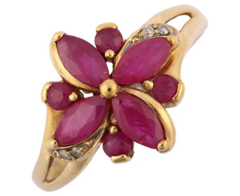 A modern 9ct gold ruby and diamond cluster flowerhead ring, setting height 14.1mm, size R, 2.8gNo damage or repair, all stone