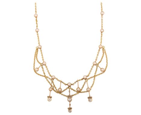 An Art Nouveau pearl and diamond festoon necklace, circa 1900, unmarked gold settings with graduated pearl and diamond flower