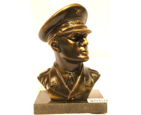 A large cast metal bronzed bust, The Gallant Luftwaffe Officer, raised on a granite plinth, H: 19 cm. P&amp;P Group 3 (£25+VA