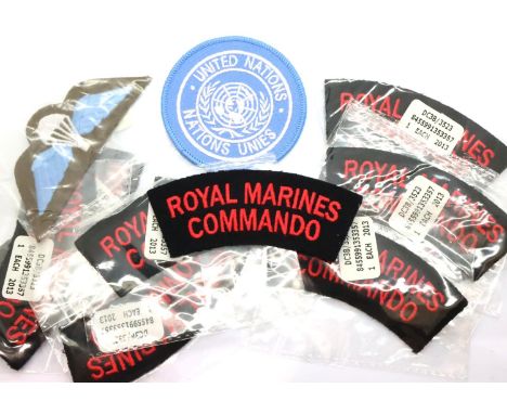 Royal Marines Commandos; ten unissued shoulder flashes, Para wings and a UN patch. P&amp;P Group 1 (£14+VAT for the first lot