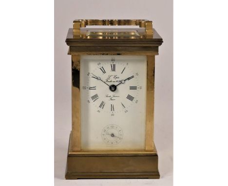 L'Epee, France, a brass alarm time piece, the white enamel dial with Roman numerals, over a subsidiary alarm dial, the 11 jew