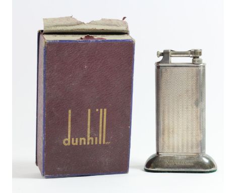 Dunhill, a vintage silver plated petrol table lighter, the arm with Reg No 737438, engine turned body, engraved Mitchel, 1 Be