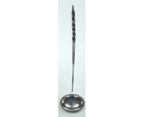 A George IV silver toddy ladle, by William Bateman, London 1826, twisted whalebone handle, gadroon border bowl detached, make