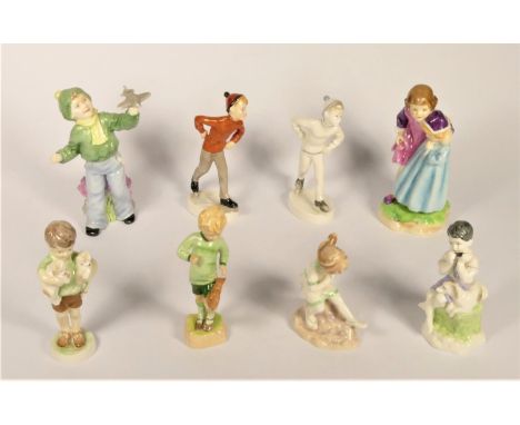 A group of eight Royal Worcester figurines, to include Babes in the wood, 3302, Boys and Girls, 2 x boy skating, different co