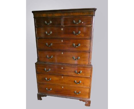 A 19th century chest on chest, moulded cornice, over two short and six long drawers, raised on ogee bracket feet, 108 x 52 x 