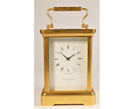 Mappin &amp; Webb, London, a brass 1/2 hour striking carriage clock, the white enamel dial with Roman numerals, the 11 jewel 