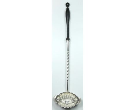 A French Alfenide toddy ladle, by Charles Halphen, Paris, c.1880, turned ebony handle, 37cm.Alfenide is an alloy of nickel & 
