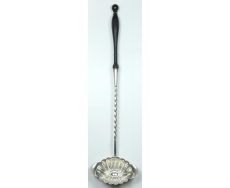 A French Alfenide toddy ladle, by Charles Halphen, Paris, c.1880, turned ebony handle, 37cm.Alfenide is an alloy of nickel & 