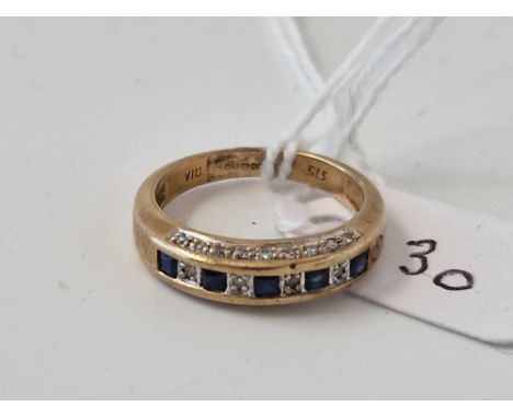 A Sapphire And Diamond Eternity Ring With Diamonds Set On Head 9Ct Size M