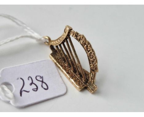 A Novelty Pendant In The Form Of A Harp 9Ct 3.1 Gms