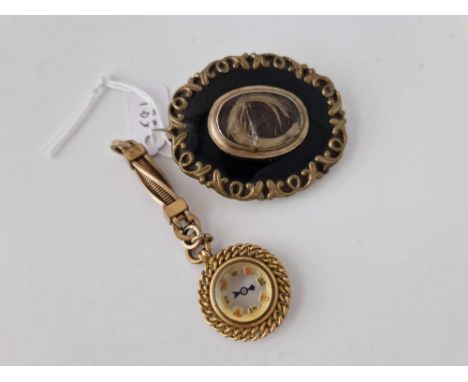 A Compass Fob And Brooch