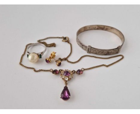 A Bag With Silver Bangle Etc.