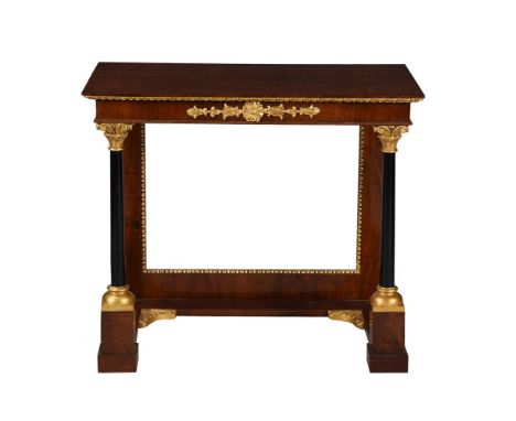 A MAHOGANY, EBONISED, AND PARCEL GILT CONSOLE TABLE IN EARLY 19TH CENTURY STYLEEARLY 20TH CENTURY With columnar supports to t