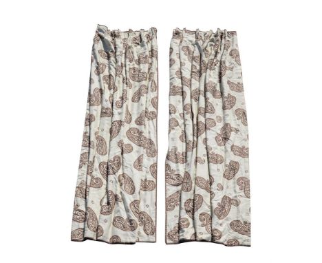TWO PAIRS OF CURTAINSEach in paisley type fabric with large boteh motifsApproximately 100cm wide (at the tops) 289cm drop ove