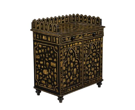 AN EBONISED AND DECOUPAGE DECORATED SIDE CABINET19TH CENTURY AND LATERWith an arcaded three-quarter gallery, above a drawer a