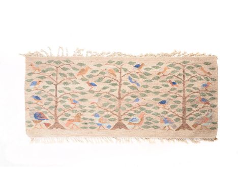 A PORTUGUESE WOOL WORK WALL HANGING OR RUG20TH CENTURYRepeating tree of life motifs and stylised birds100cm high, 230cm wideC