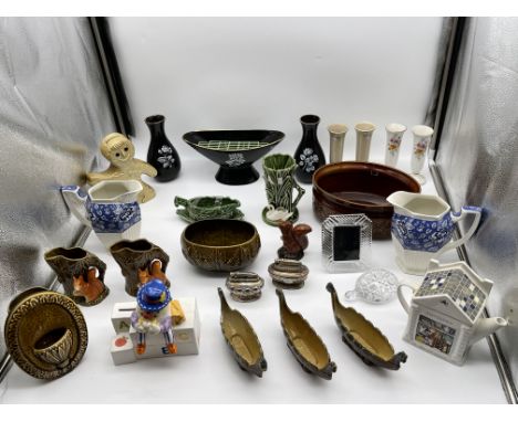 Collection of Porcelain and Ceramic items to include Wade, Sylvac, Ronson Lighters and others. 