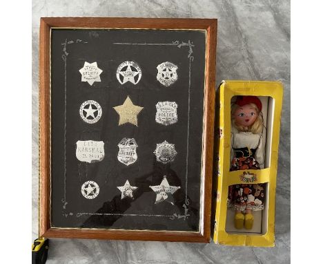 Cased Collection of Twelve Replica American Sheriff's Badges along with Pelham Puppet in tact and in box. 