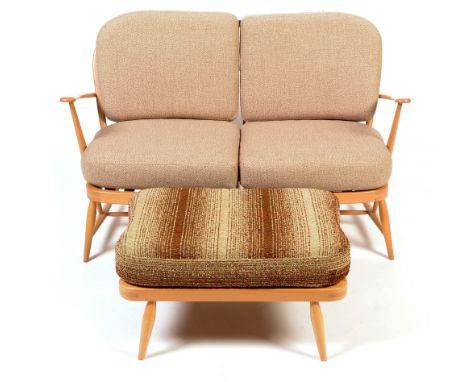 Ercol: a Windsor beech settee, No 344: and a Windsor beech extension stool, No 341. (2)