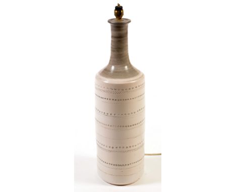A modern glazed bottle form stoneware lamp with large shade, 62cms high.