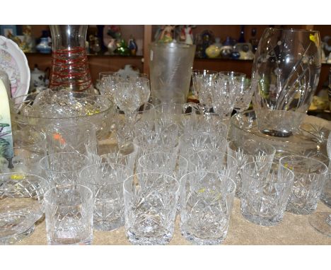 A QUANTITY OF CUT GLASS AND CRYSTAL ITEMS, approximately forty pieces to include a Royal Doulton crystal vase height 26cm, a 