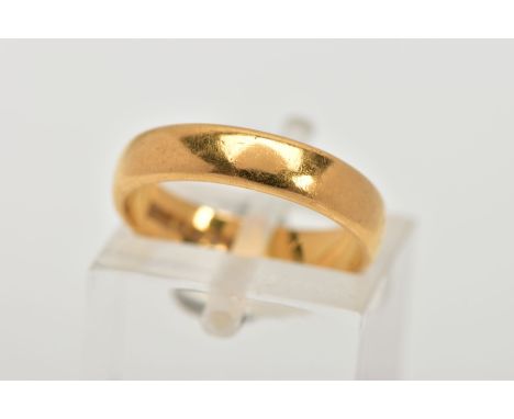A 22CT GOLD BAND RING, a soft courted band ring approximate width 4mm x depth 1mm, ring size I 1/2 leading edge, hallmarked 2
