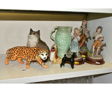 A GROUP OF CERAMIC ORNAMENTS, eight pieces comprising a Beswick Leopard no 1082, height 12cm, a Beswick Grey (shaded) Persian