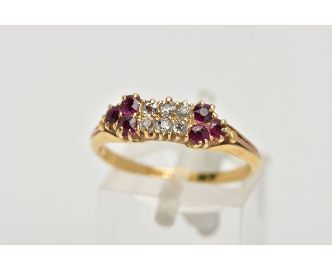 A DIAMOND AND RUBY RING,  six old cut diamonds prong set in yellow metal, accented with three circular cut rubies each side, 