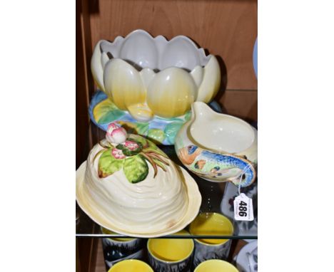 TWO PIECES OF CLARICE CLIFF NEWPORT POTTERY AND A ROYAL STAFFORDSHIRE CLARICE CLIFF WATER LILY PLANTER, shape no. 973, height
