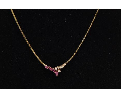 A RUBY AND DIAMOND COLLAR NECKLACE, a yellow metal flat link chain leading onto four graduating marquise cut rubies and six v