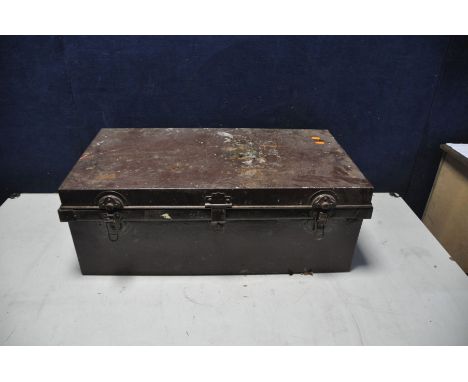 A VINTAGE GARRISON TIN TRUNK