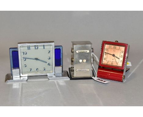 A VINTAGE JAEGER TWO DAY TRAVEL ALARM CLOCK, chromed and red painted case, square copper dial with Arabic numerals, height 8c
