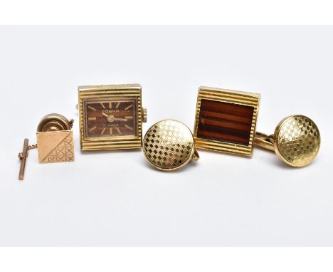 A 9CT GOLD TIE PIN AND TWO PAIRS OF GOLD-PLATED CUFFLINKS, the tie pin of a square form, half with a diamond cut pattern, hal