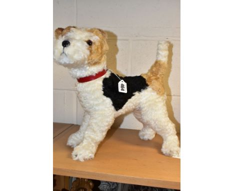 A STEIFF 'FOXY FOX TERRIER' NO. 031717, with mohair in naturalistic colouring, yellow tag and button to ear, product informat