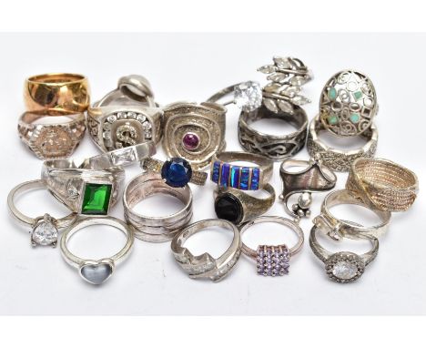 AN ASSORTEMENT OF WHITE METAL RINGS, to include a large silver signet ring set with colourless stones hallmarked Birmingham, 